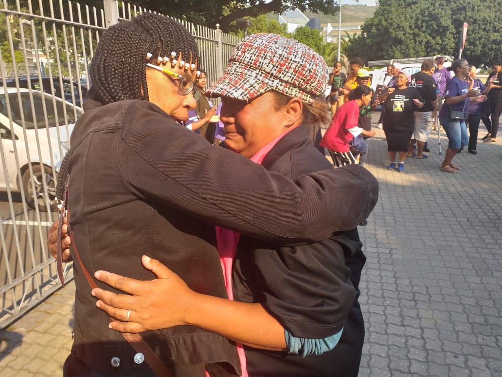 Photo of two women hugging