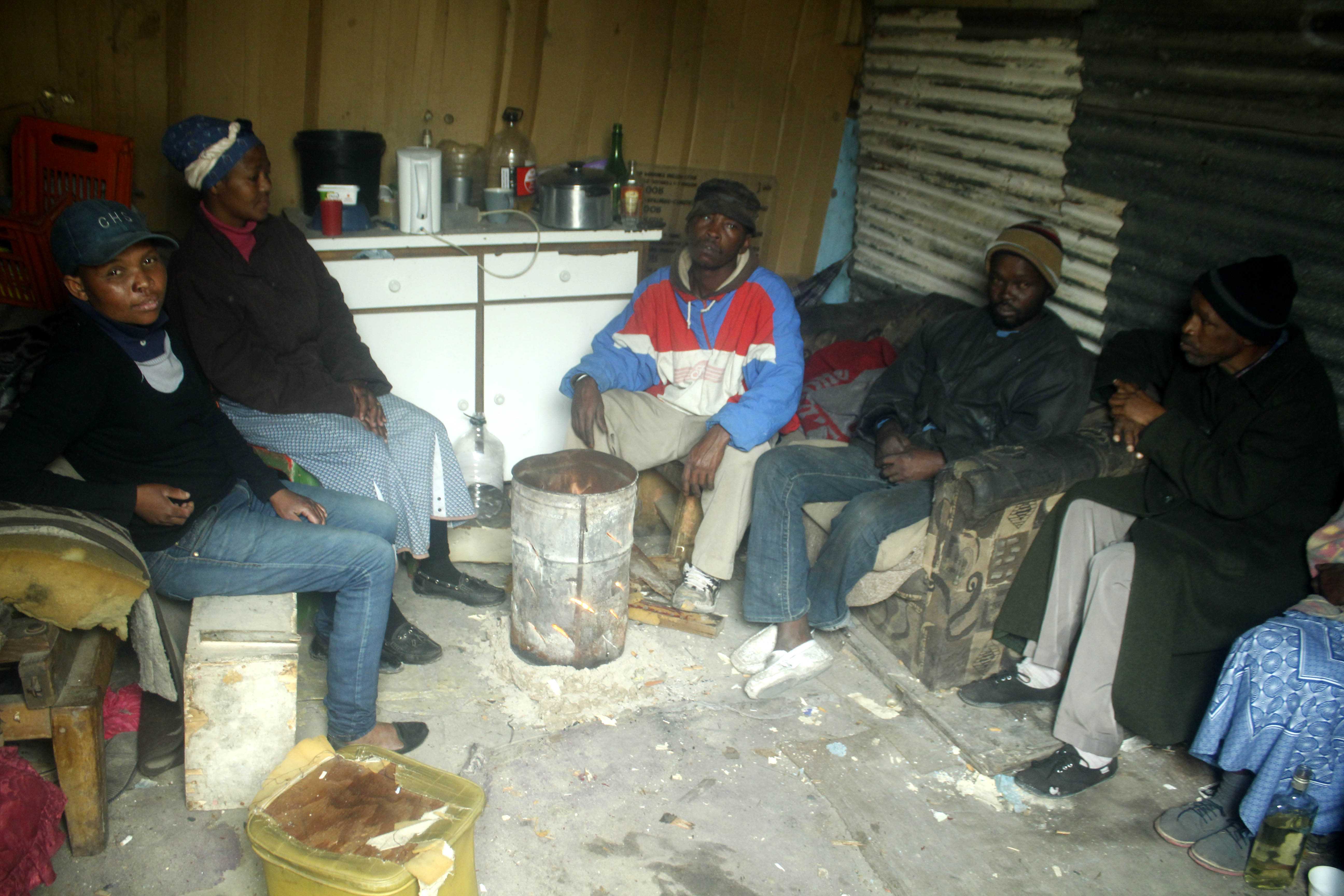 People sitting around a fire