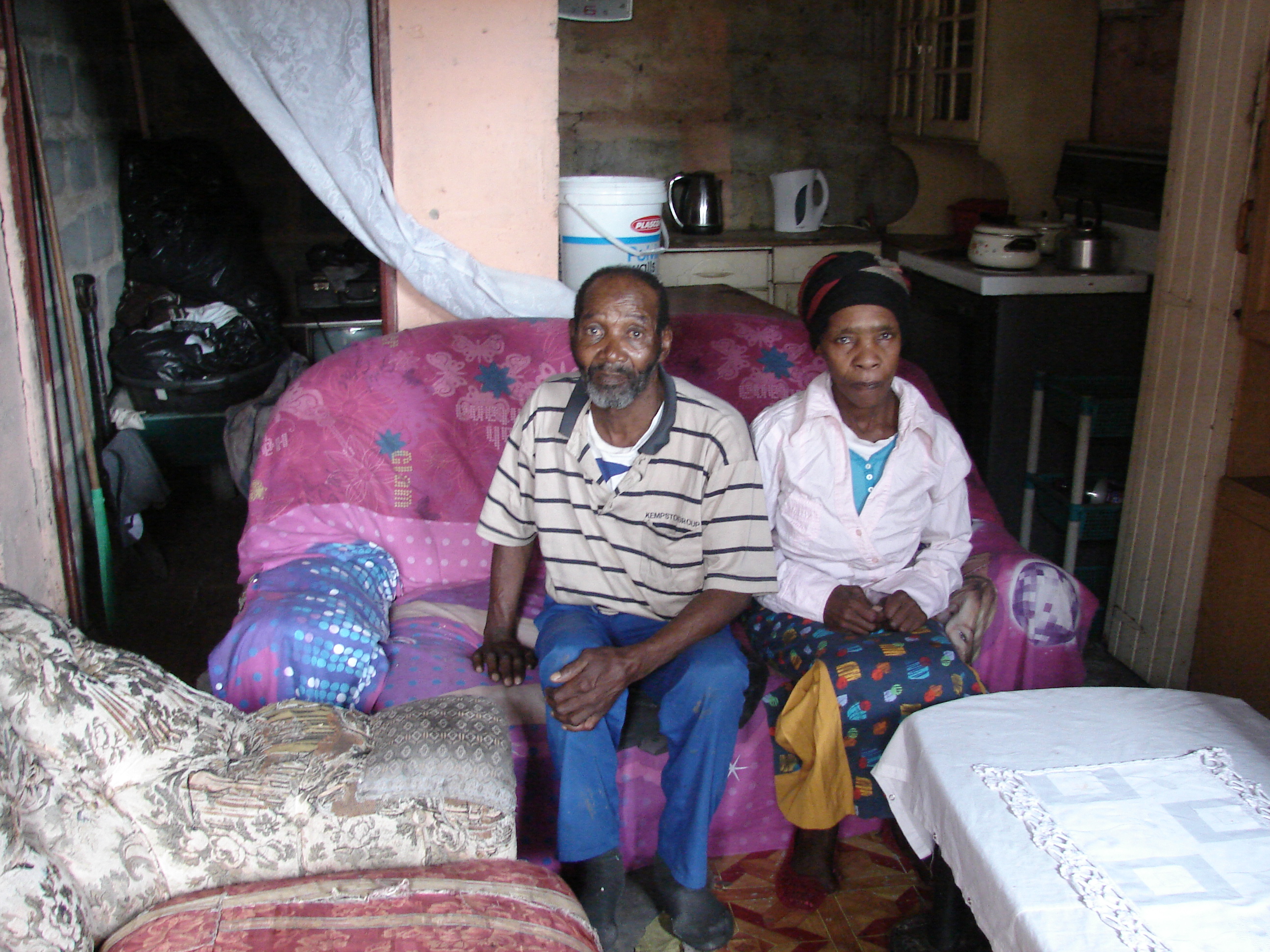 Photo of a couple in their home